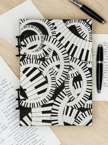 Piano Keyboard Refillable A5 Journal – Music Lover Notebook, Swirling Keys Design