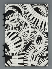 Piano Keyboard Refillable A5 Journal – Music Lover Notebook, Swirling Keys Design